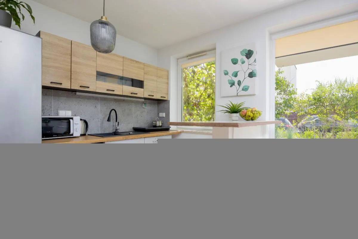 Image 2 of Exceptional Studio with Parking and Garden by Noclegi Renters