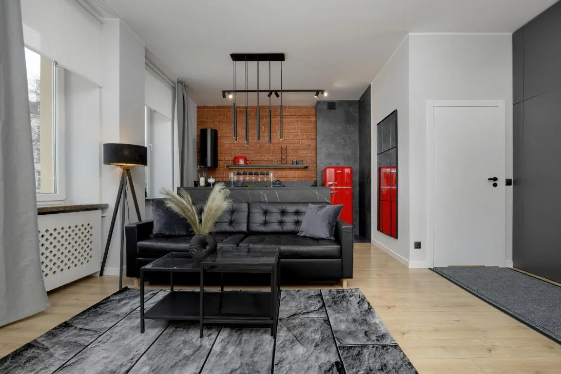 Image of Exclusive Grey and Red Apartment in Warsaw Center by Noclegi Renters