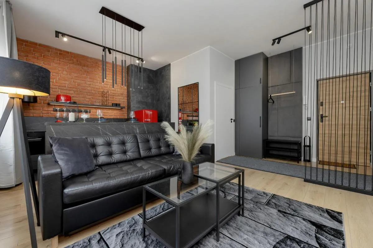 Image 4 of Exclusive Grey and Red Apartment in Warsaw Center by Noclegi Renters