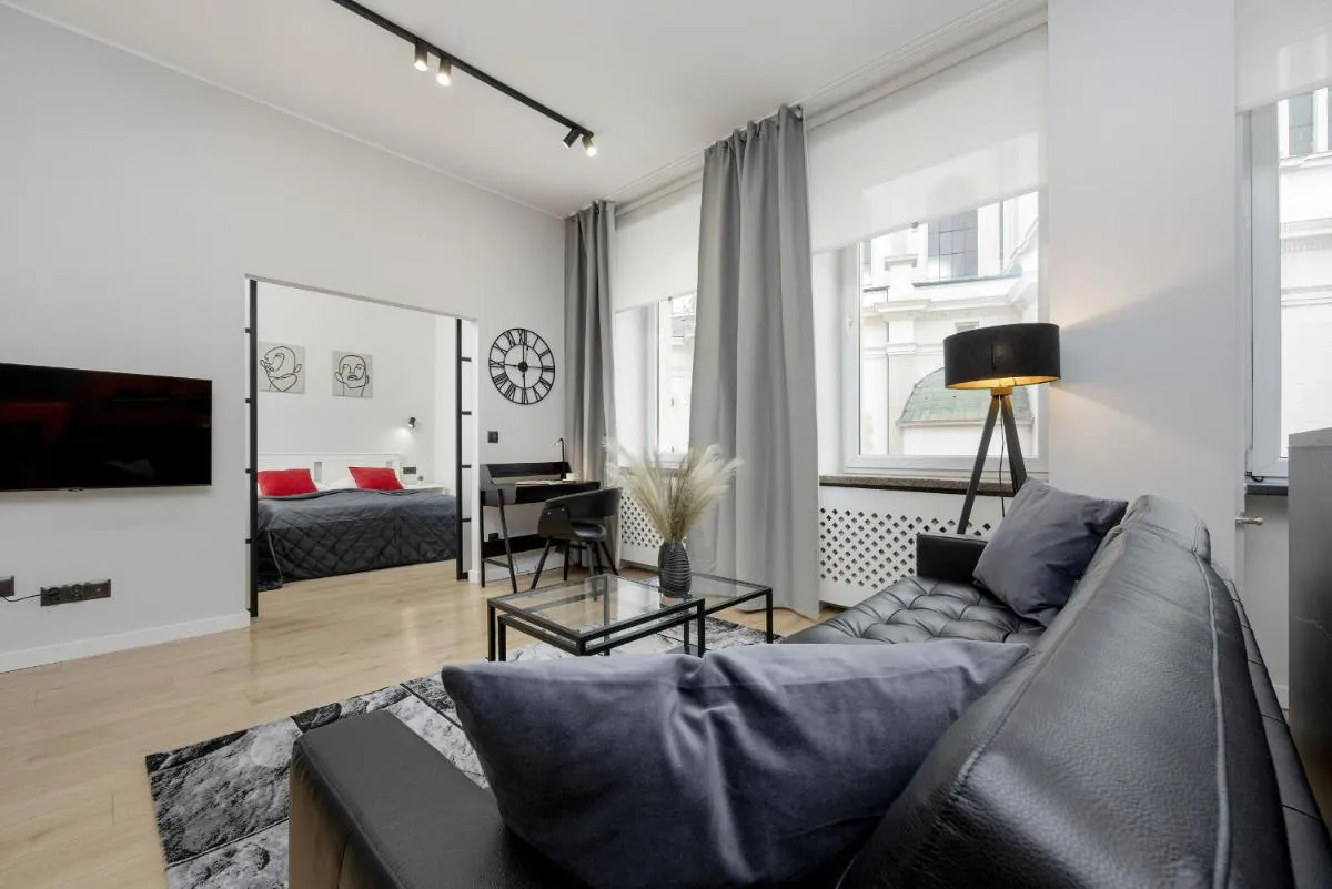 Image 3 of Exclusive Grey and Red Apartment in Warsaw Center by Noclegi Renters