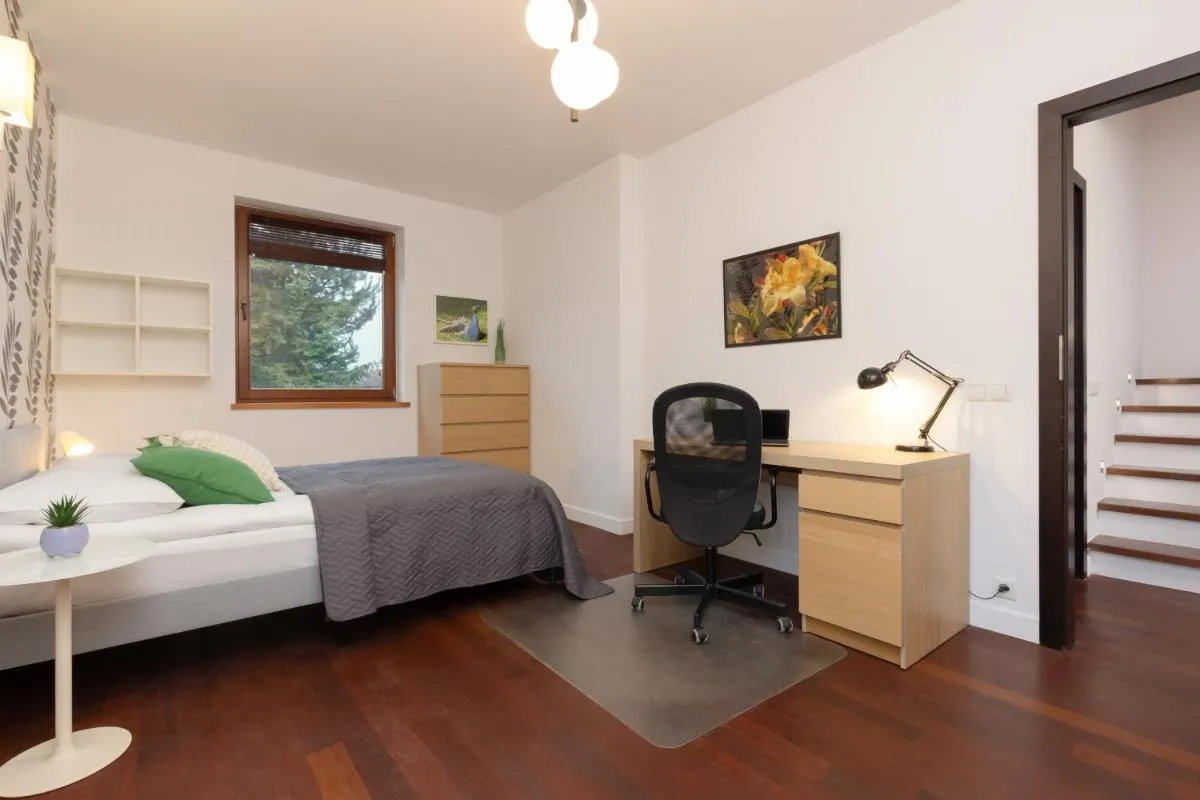 Image 1 of Spacious Two-Story 4-Bedroom House with Parking and Garden in Warsaw by Noclegi Renters