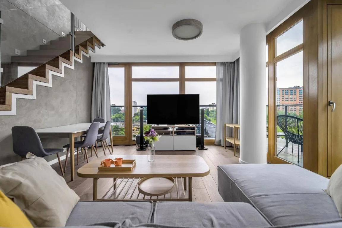 Image of Warsaw Prestige Suites – 86m2, Two-Level Loft, Parking – by Rentujemy