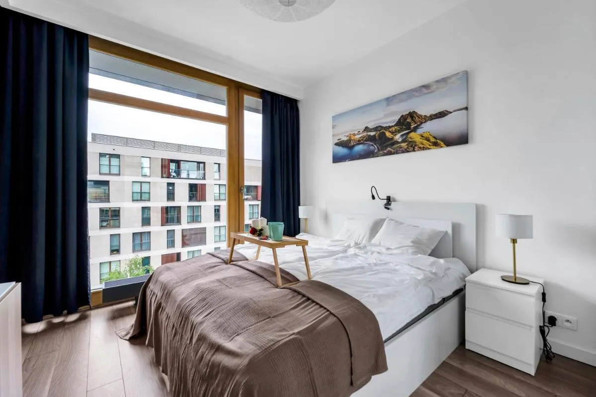 Image 1 of Warsaw Prestige Suites – 86m2, Two-Level Loft, Parking – by Rentujemy