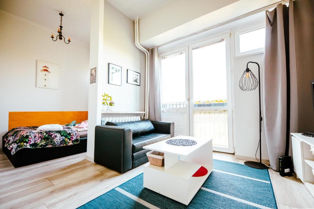 Image of 6th Floor Modern Apartment with French Balcony and City Views