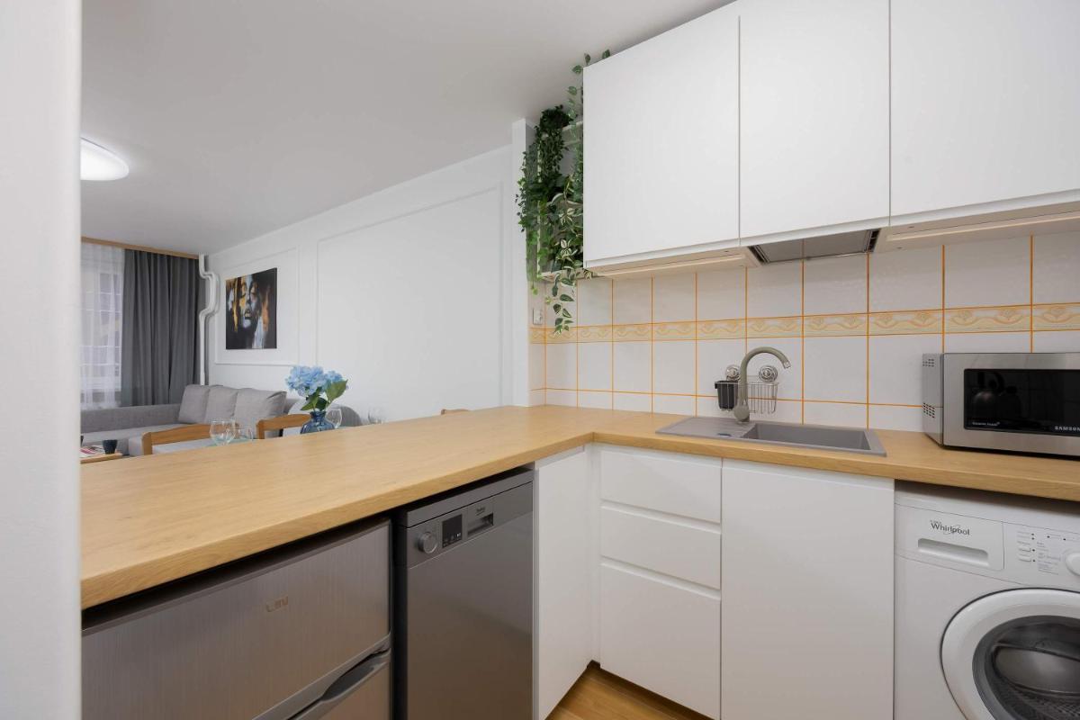 Image 3 of Bright Apartment with Air Conditioning in the Capital by Noclegi Renters