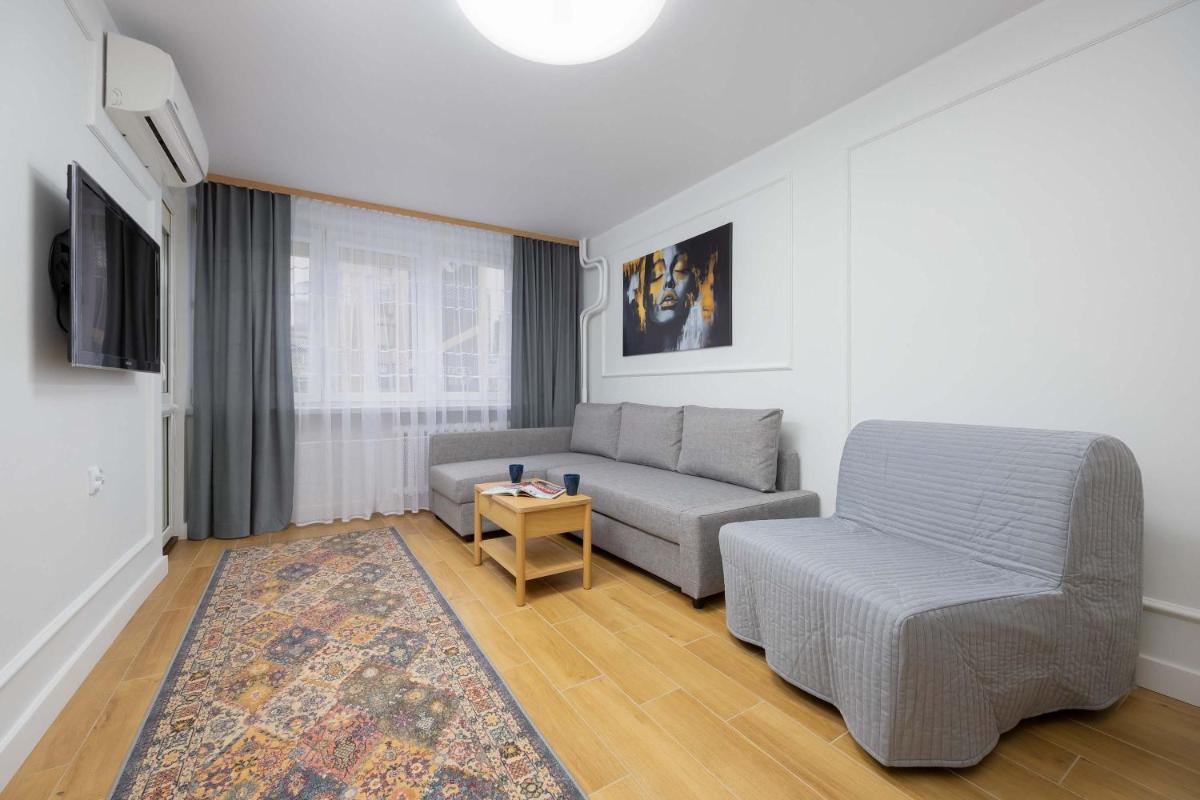 Image 4 of Bright Apartment with Air Conditioning in the Capital by Noclegi Renters