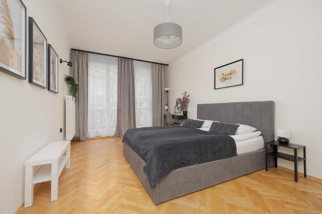 Image of Bright Apartment with Balcony in Warsaw Wola by Noclegi Renters
