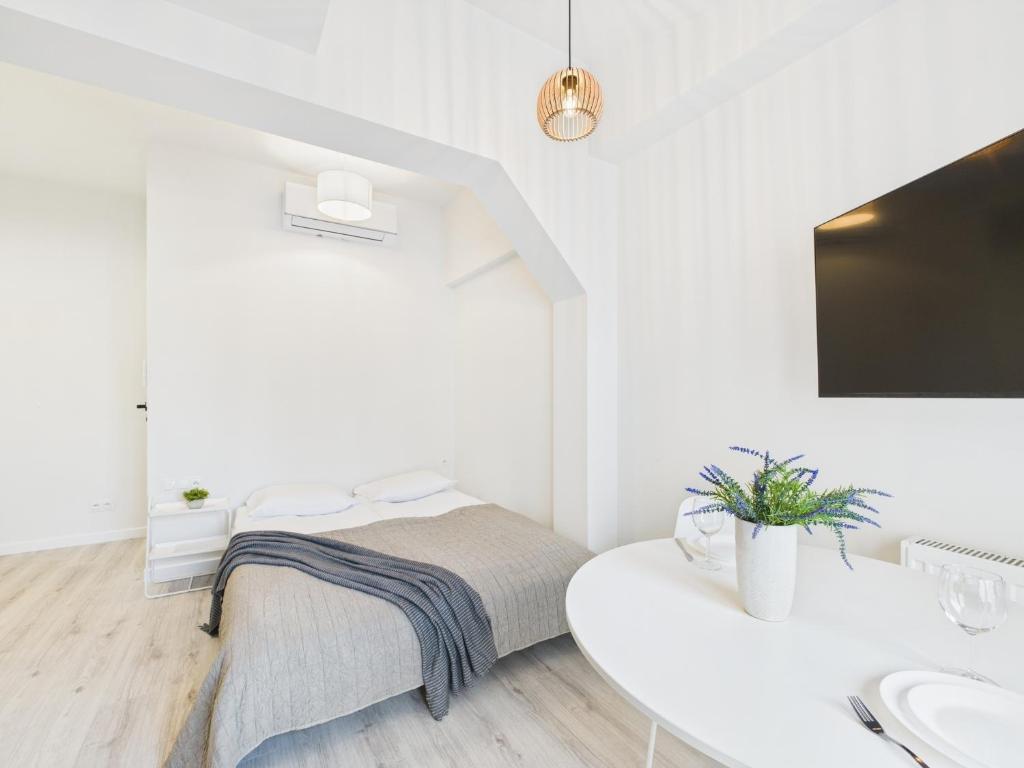 Image of Bright Apartments with Air Conditioning Near the Copernicus Science Center in Warsaw by Noclegi Renters