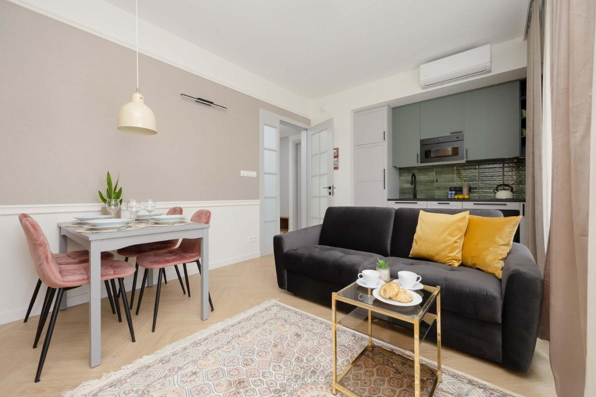 Image 2 of Charming One Bedroom Apartment with Air Conditioning in the Capital by Noclegi Renters