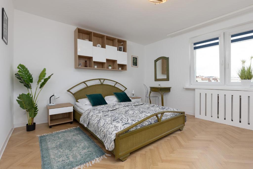 Image of Elegant Warsaw Apartment with AC 550 m to Copernicus Science Centre by Noclegi Renters