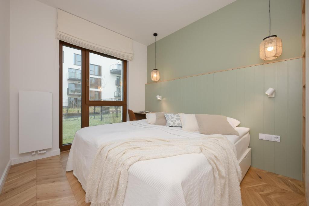 Image of LUX Pastel Oasis Family Apartment with Parking & Gym by Renters Prestige