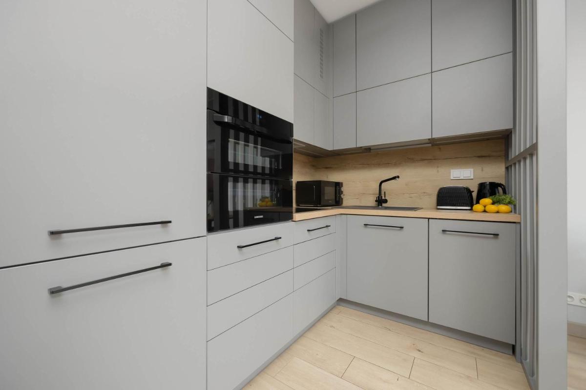 Image 6 of Metro Wola Apartment with Parking & AC next to Warsaw Rising Museum by Noclegi Renters