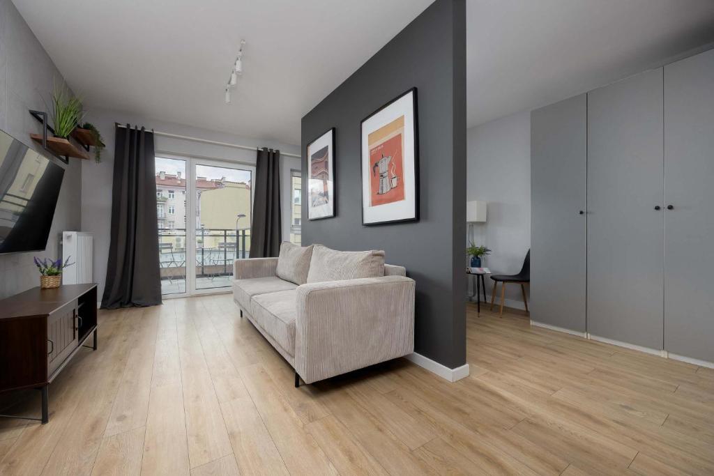 Image of Unique Bright Studio for 4 People Remote Work & Balcony Close to PGE by Noclegi Renters
