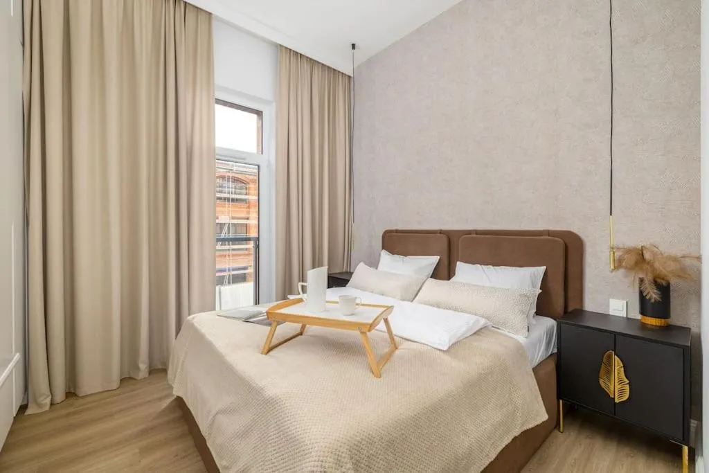 Image 1 of 1-Bedroom Coffee Apartment ECRU near Metro WWA49