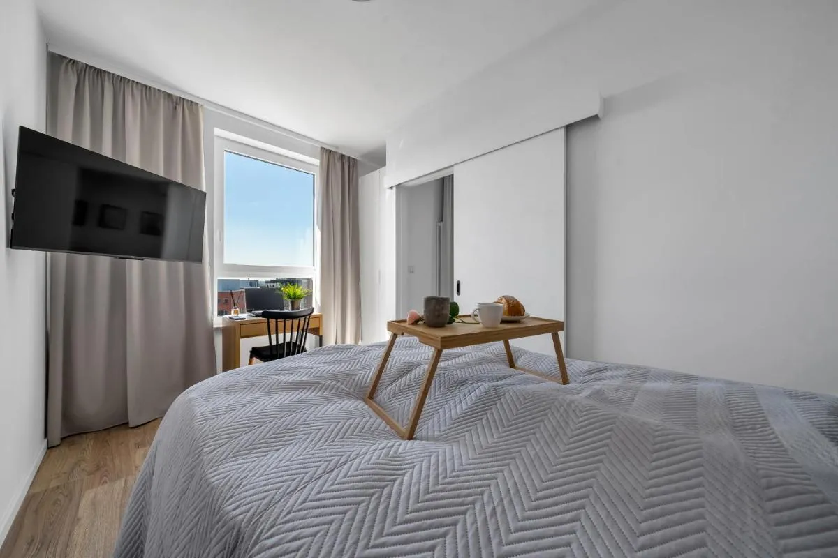 Image 1 of 7th Floor Warsaw Włochy Apt – Balcony, Workspace – by Rentujemy