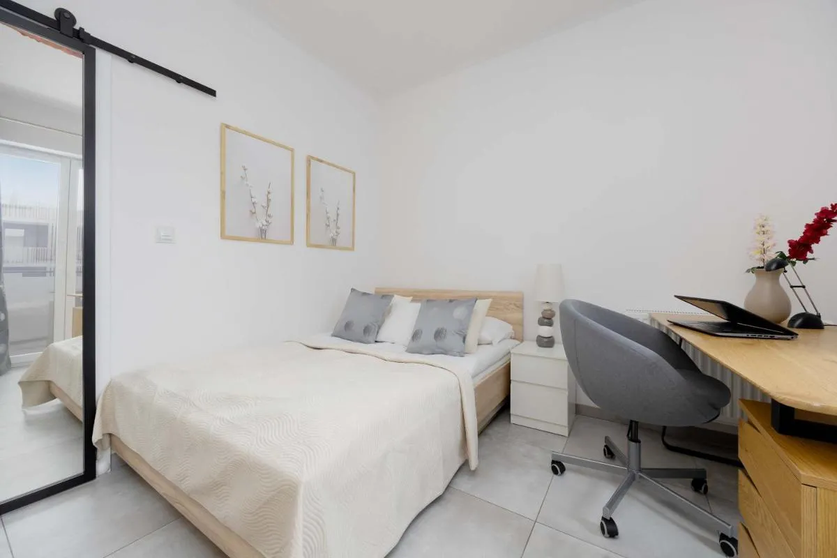 Image 1 of Bright Apartment with Parking and Remote Work in Warsaw Wola by Noclegi Renters