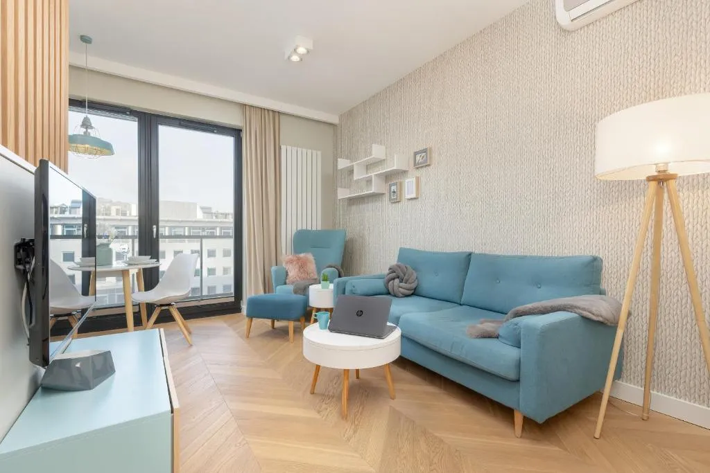 Image of Bright Blue Apartment with Balcony, Parking and Air Conditioning in Warsaw by Noclegi Renters