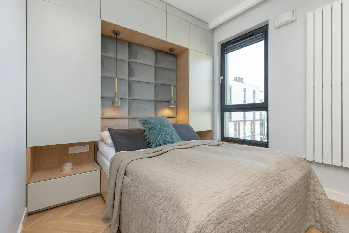 Image 1 of Bright Blue Apartment with Balcony, Parking and Air Conditioning in Warsaw by Noclegi Renters