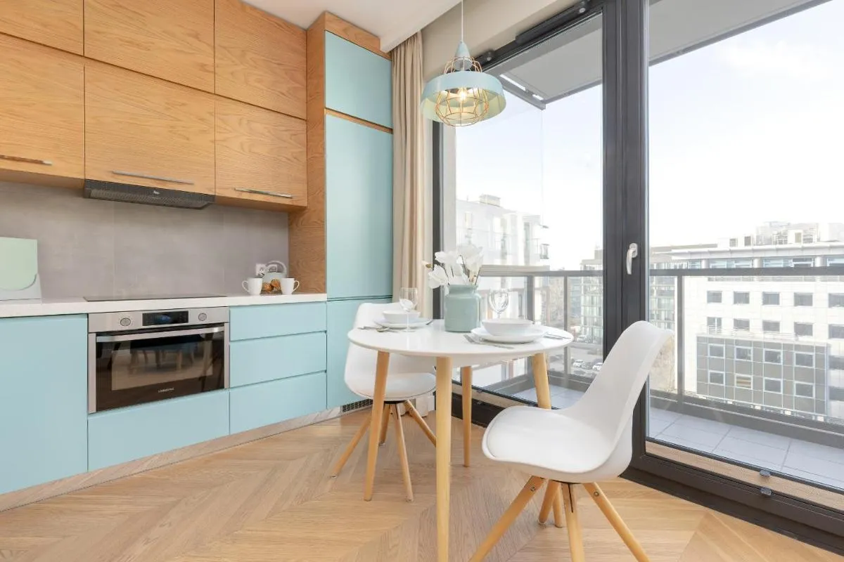 Image 2 of Bright Blue Apartment with Balcony, Parking and Air Conditioning in Warsaw by Noclegi Renters