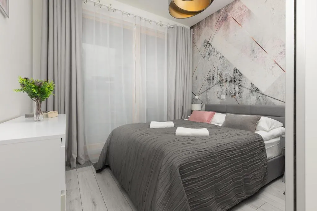 Image of Elegant Apartment with Balcony & Bathtub Warsaw Wola by Noclegi Renters