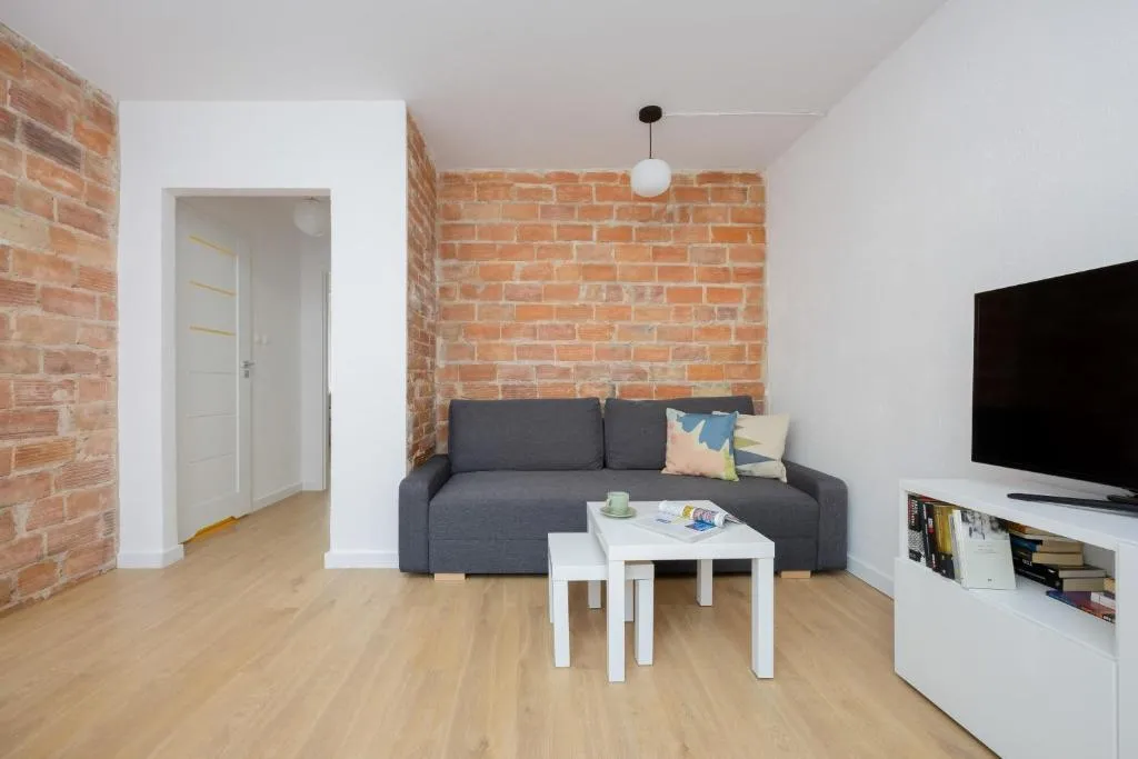 Image of Family Apartment with Balcony by Noclegi Renters