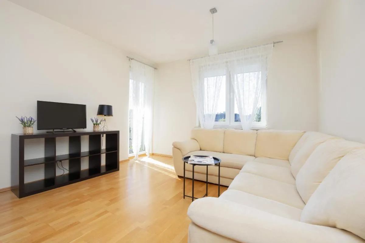 Image 2 of Modern & Spacious Apartment with Balcony and Parking by Noclegi Renters