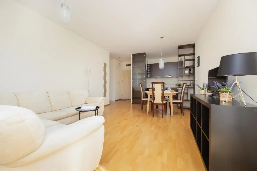 Image of Modern & Spacious Apartment with Balcony and Parking by Noclegi Renters