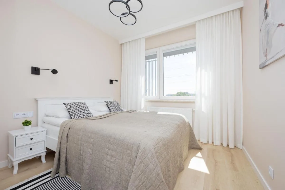 Image 1 of Stacja Wola Nowoczesny Apartament z Balkonem i Parkingiem Warszawa by Noclegi Renters