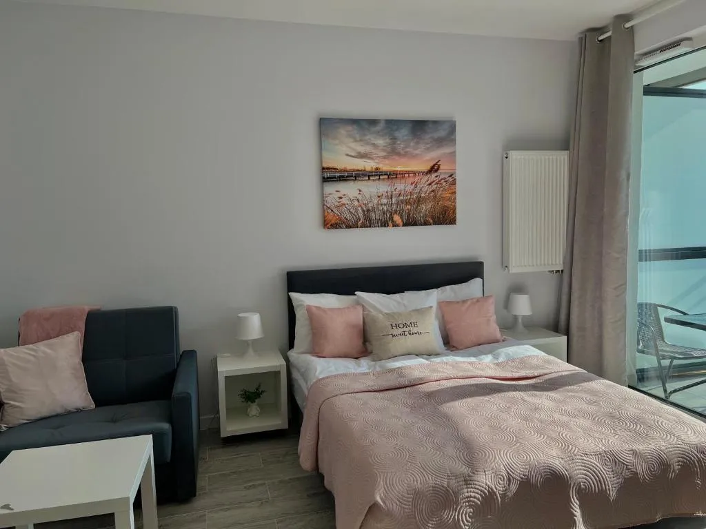 Image of Studio Apartment Raspberry by Galeria Północna