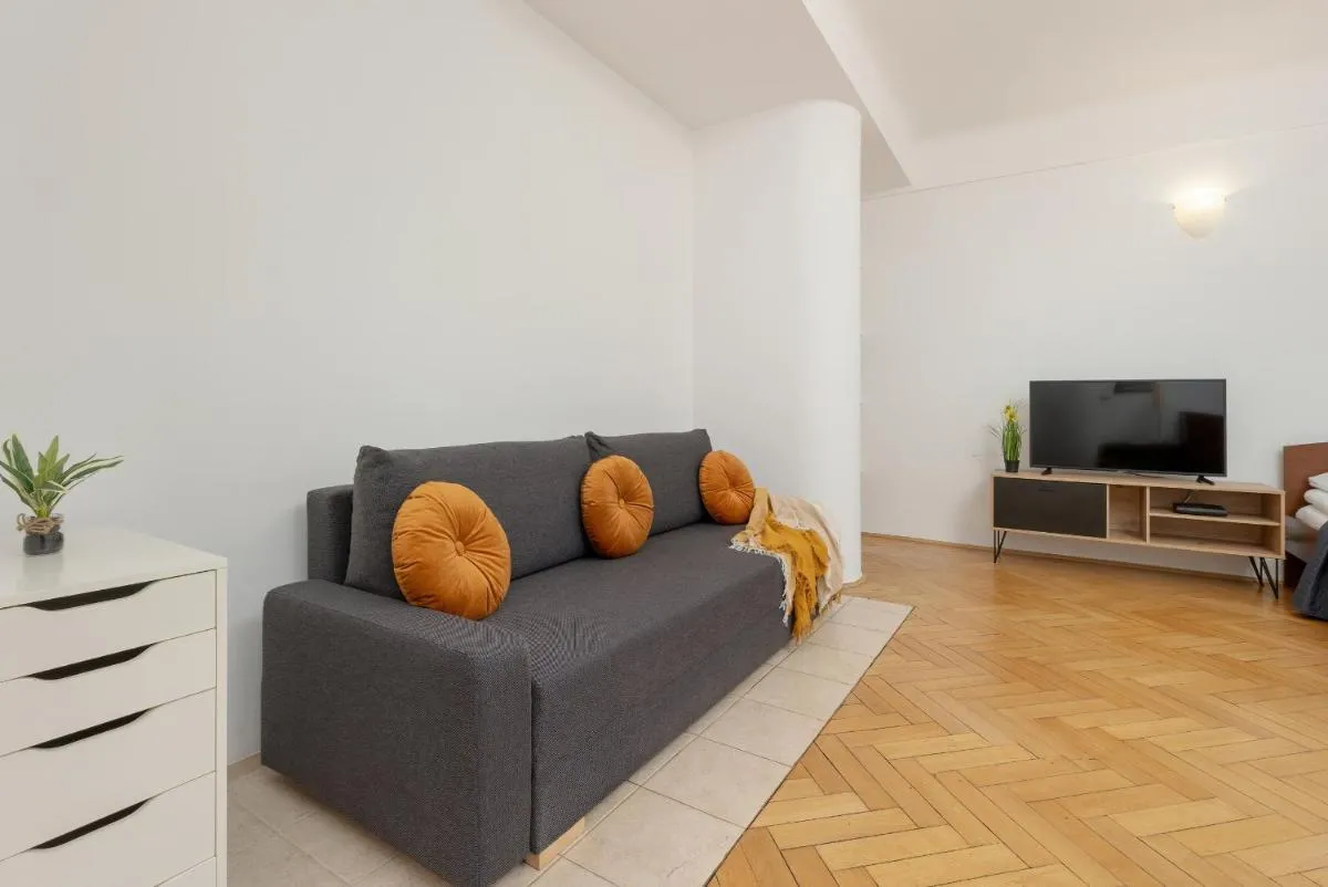 Image 1 of Studio in the Center of Warsaw with Balcony and Separate Kitchen by Noclegi Renters