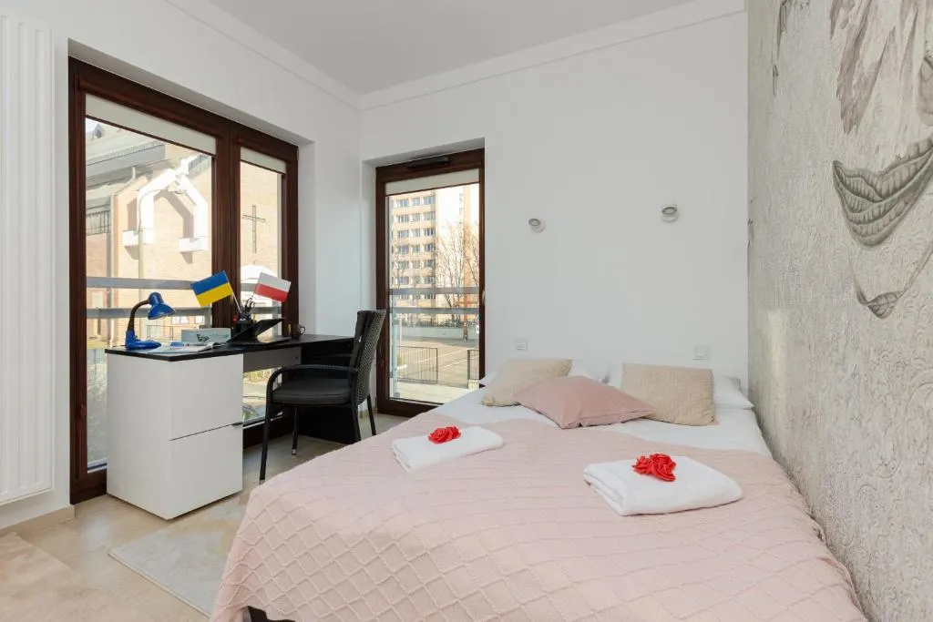 Image of Warsaw Apartment Woronicza Home Office by Noclegi Renters