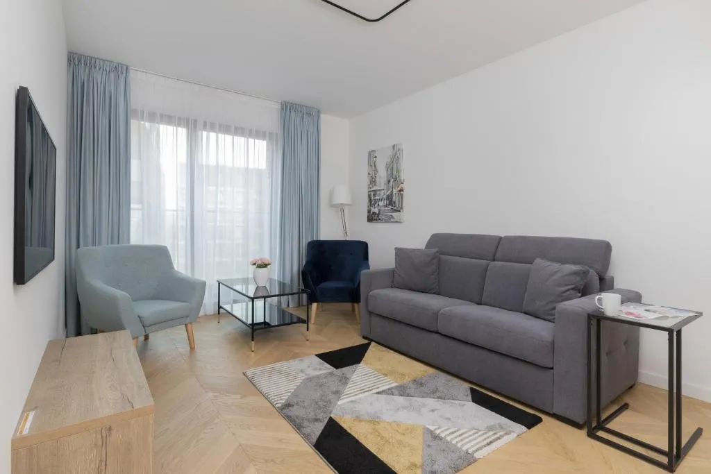 Image of Warsaw Praga Okrzei Apartment by the River by Noclegi Renters