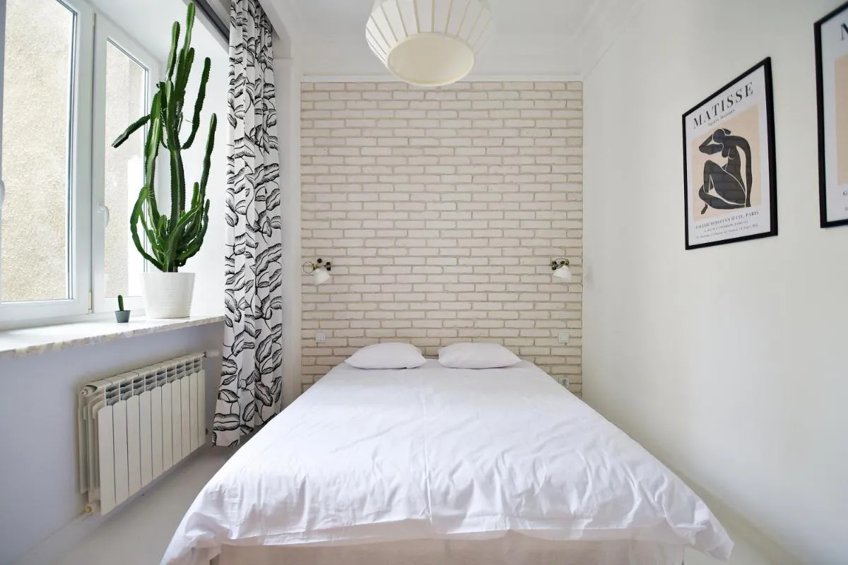 Image 1 of White Boho Apartment